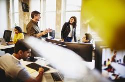 Group in an office having a conversation