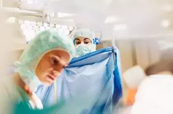 Doctors in a surgery room. 
