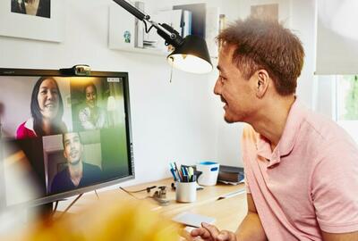 man having a digital meeting at home
